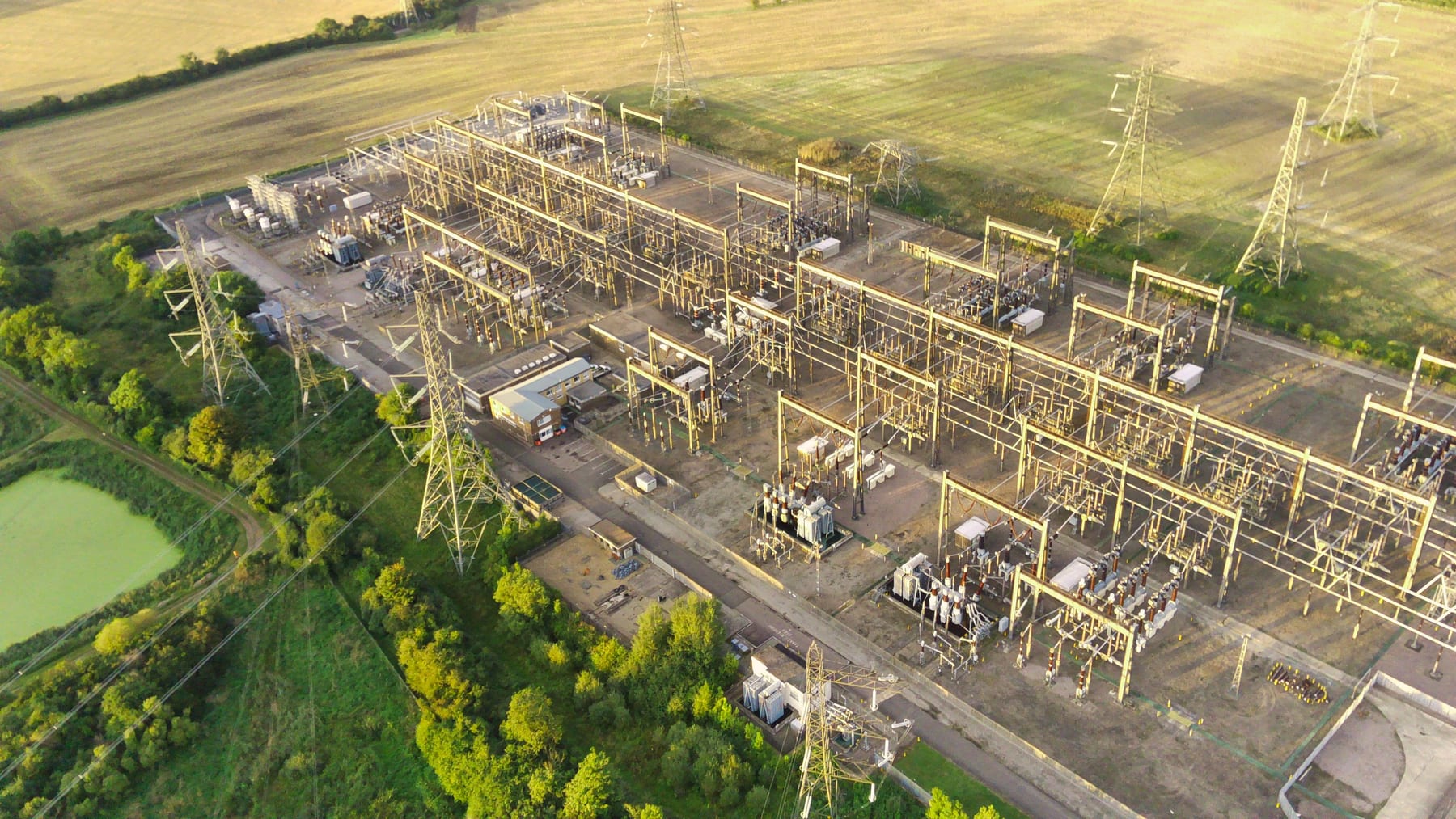 Aerial view of a substation between fields